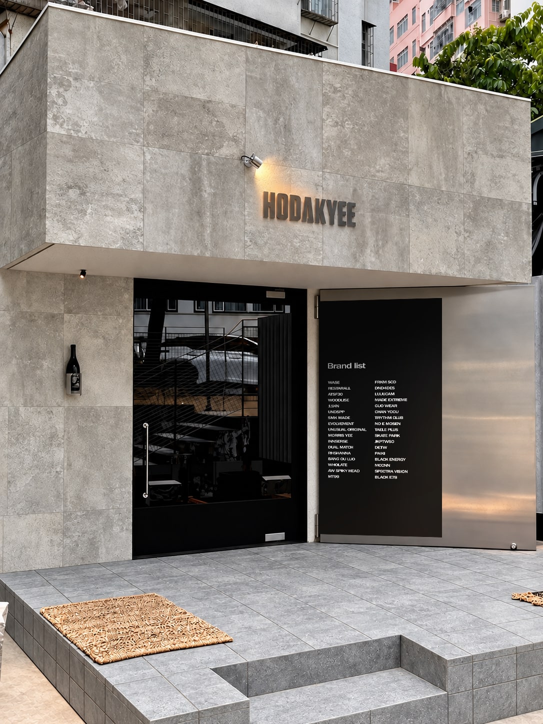 HODAKYEE storefront with a concrete facade and an independent brand directory