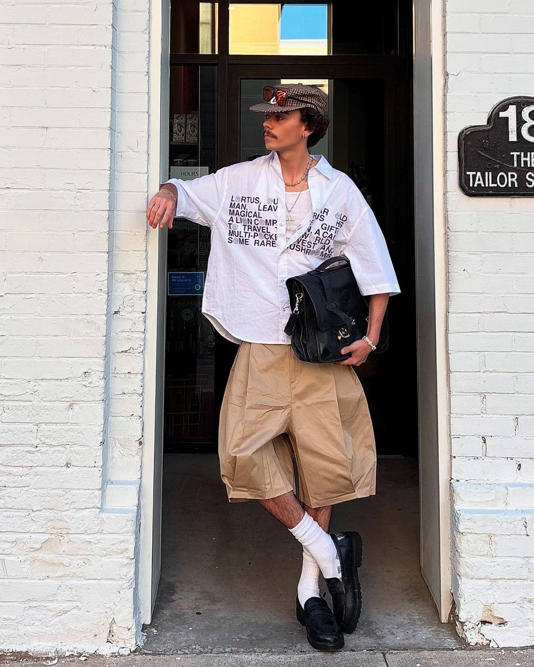 Coated Pleated Wide Shorts worn on model, image 02