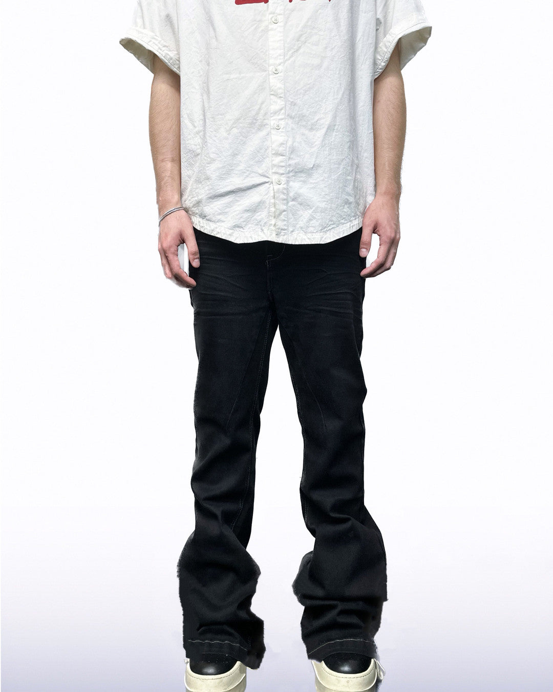 Pressed-Crease Stacked Flare Jeans worn on model, image 01