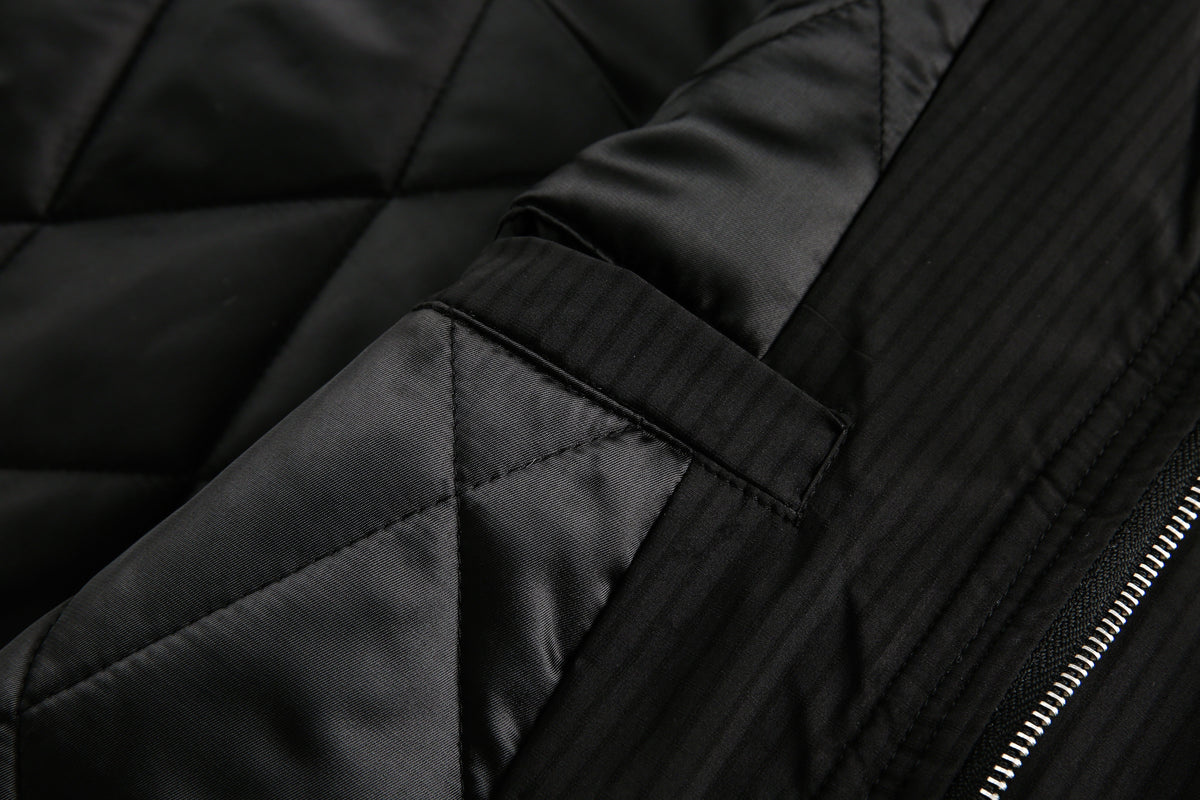 BLACK ENERGY CROSS EMBLEM FUR HOOD JACKET; Black; garment construction detail