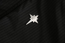 BLACK ENERGY CROSS EMBLEM FUR HOOD JACKET; Black; design detail