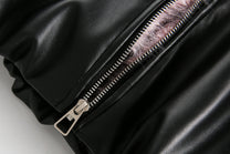 BLACK ENERGY PINK FUR TRIM JACKET; Black; garment construction detail