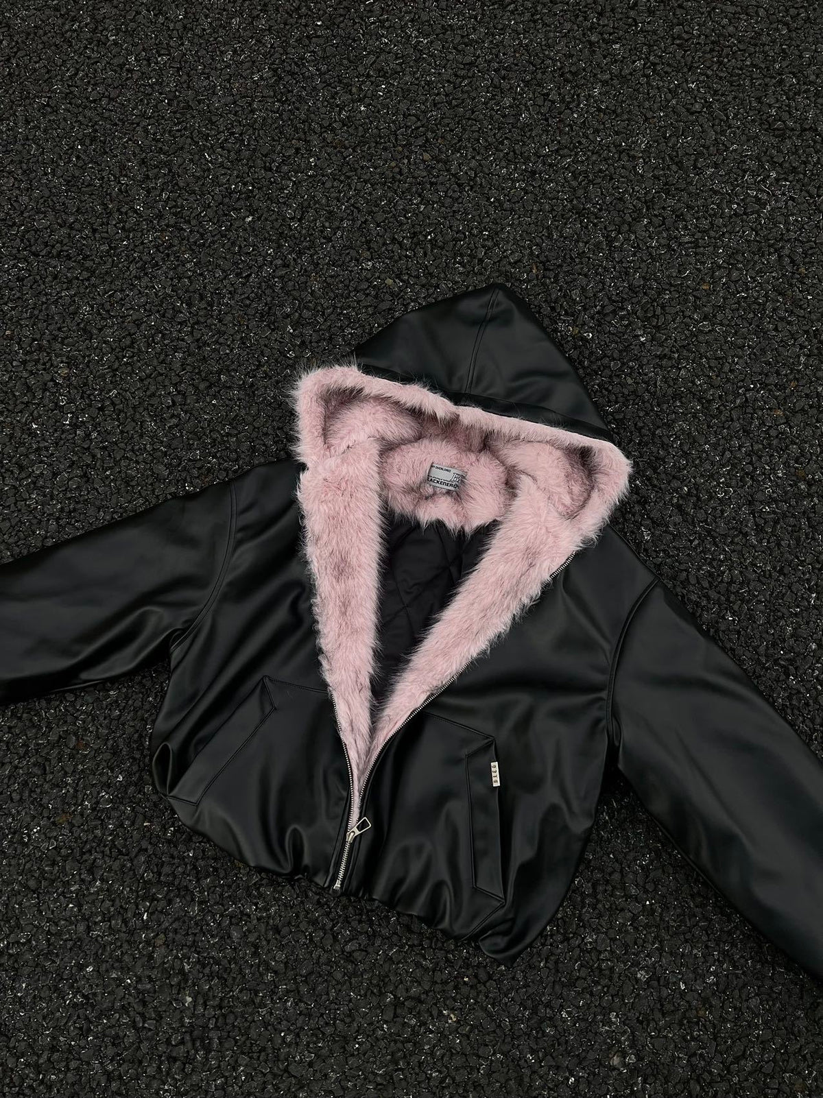BLACK ENERGY PINK FUR TRIM JACKET; Black; front view in a styled setting
