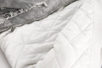 GUO WEAR DISTRESSED GRAPHIC PUFFER JACKET; Gray; fabric detail