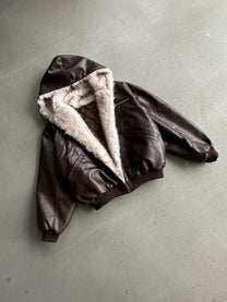 SMK MADE FUR TRIM HOODED JACKET; Brown; front view in a styled setting