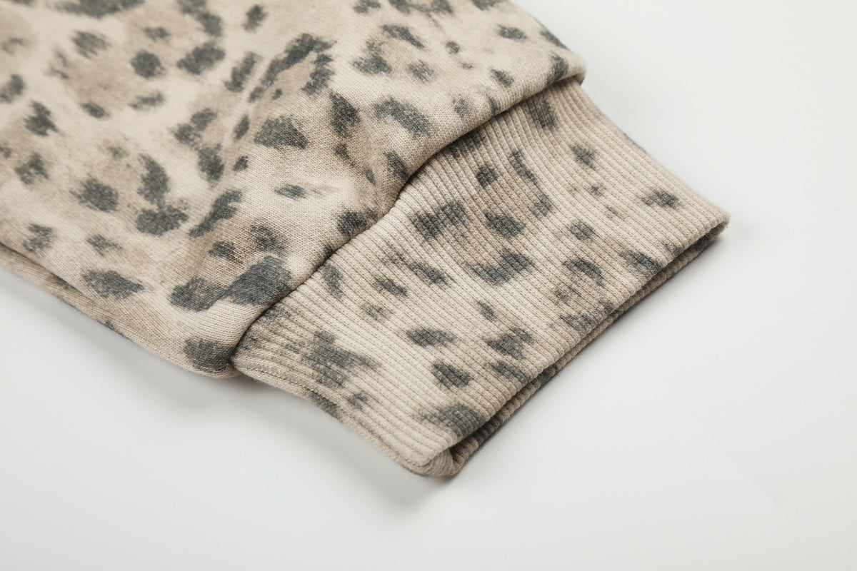 DC LEOPARD PRINT ZIP UP HOODIE; Leopard; garment construction detail