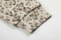 DC LEOPARD PRINT ZIP UP HOODIE; Leopard; garment construction detail