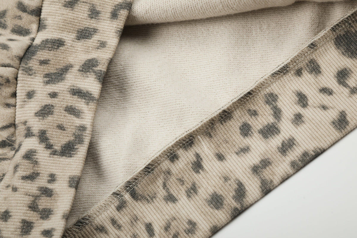 DC LEOPARD PRINT ZIP UP HOODIE; Leopard; garment construction detail