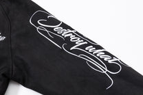 EASY BUILDING RAGLAN SCRIPT BOMBER JACKET; Black; design detail