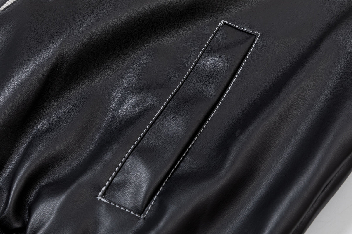 EASY BUILDING FLAME EMBROIDERED BOMBER JACKET; Black; garment construction detail