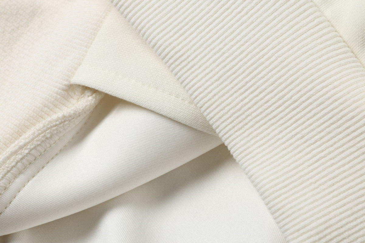 TAELE PLUS SHOULDER GRAPHIC TRACK JACKET; White; garment construction detail