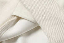 TAELE PLUS SHOULDER GRAPHIC TRACK JACKET; White; garment construction detail