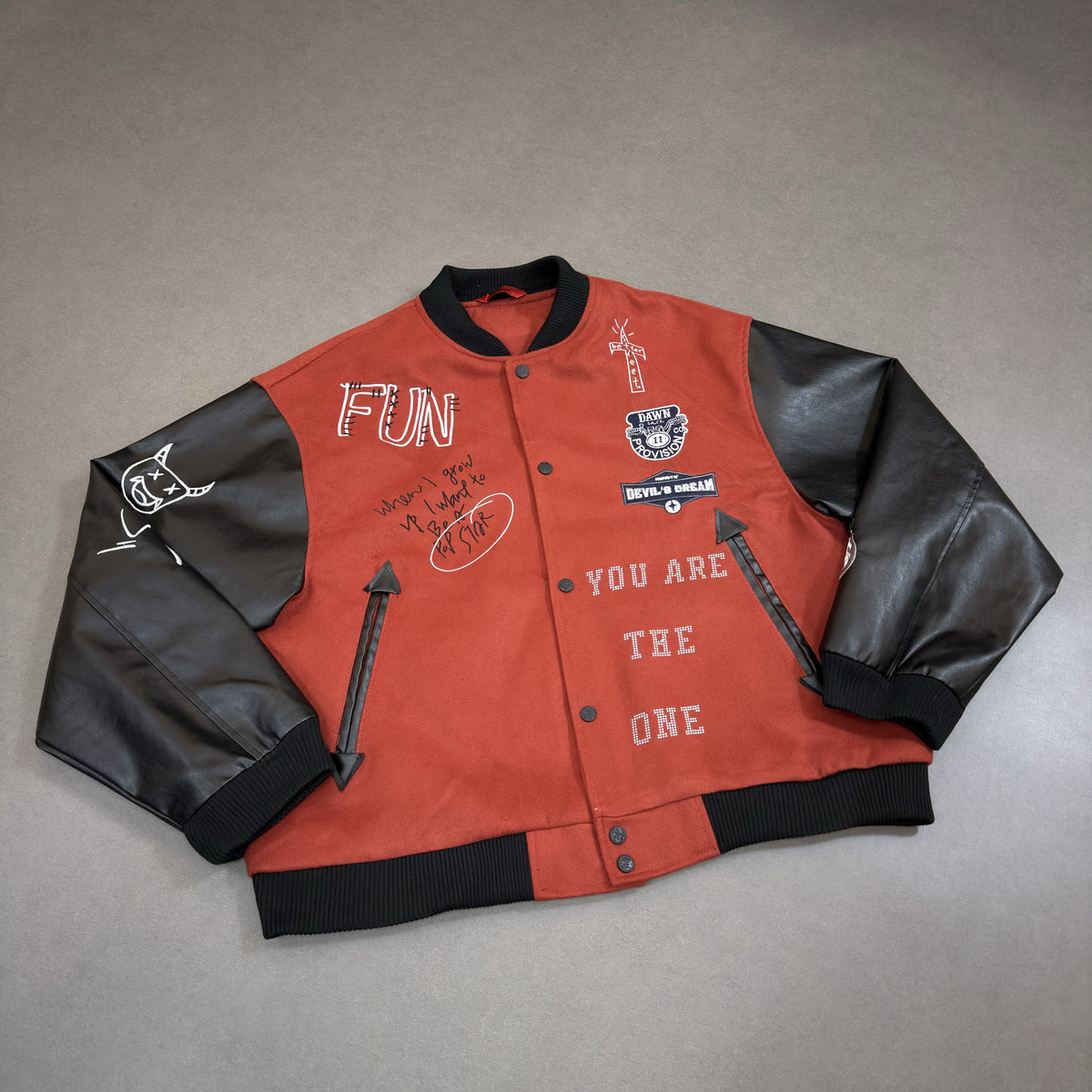 WHOLATE CONTRAST SLEEVE VARSITY JACKET; Dark Red; front view in a styled setting