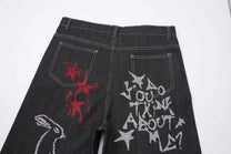 ATSF30 DARK GRAFFITI EMBROIDERED JEANS; Black; design detail