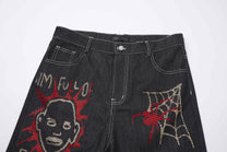 ATSF30 DARK GRAFFITI EMBROIDERED JEANS; Black; design detail