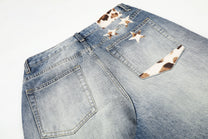 DC SPOTTED ACCENT WIDE LEG JEANS; Washed Blue; design detail