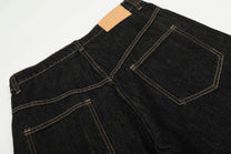EVIL ENEMY FIREMAN CLASP JEANS; Black; garment construction detail