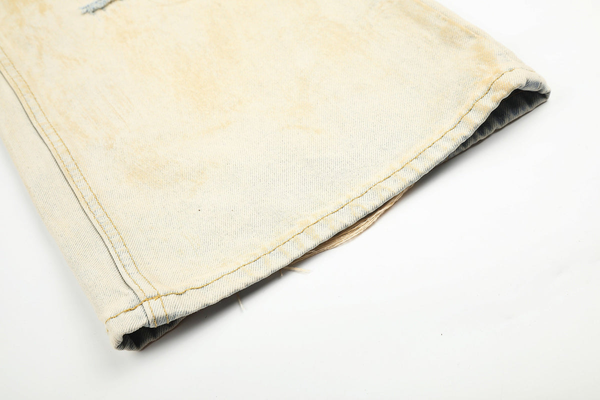 EVIL ENEMY DISTRESSED RIPPED WHITE JEANS; Cream; garment construction detail