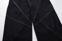 MCCNN DIAGONAL STITCH PANEL JEANS; Black; garment construction detail