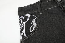 SEVEERS SCRIPT WAIST BAGGY JEANS; Black; design detail