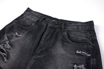 SMK MADE SLASH DISTRESSED WIDE LEG JEANS; Black; garment construction detail