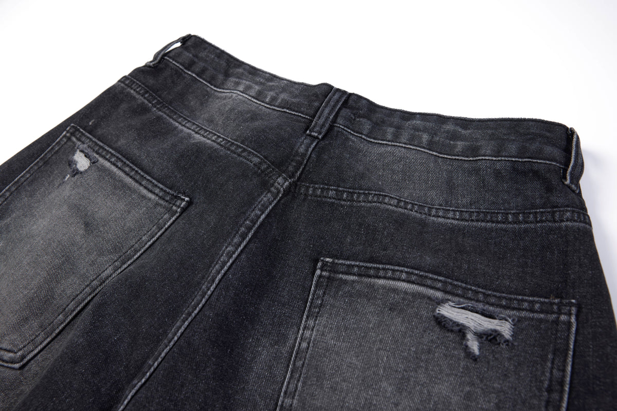 SMK MADE SLASH DISTRESSED WIDE LEG JEANS; Black; garment construction detail