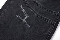 SMK MADE SLASH DISTRESSED WIDE LEG JEANS; Black; design detail