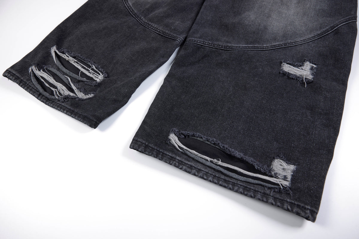 SMK MADE SLASH DISTRESSED WIDE LEG JEANS; Black; garment construction detail