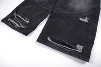 SMK MADE SLASH DISTRESSED WIDE LEG JEANS; Black; garment construction detail