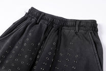 SMK MADE STUDDED WASHED WIDE LEG JEANS; Washed Black; design detail
