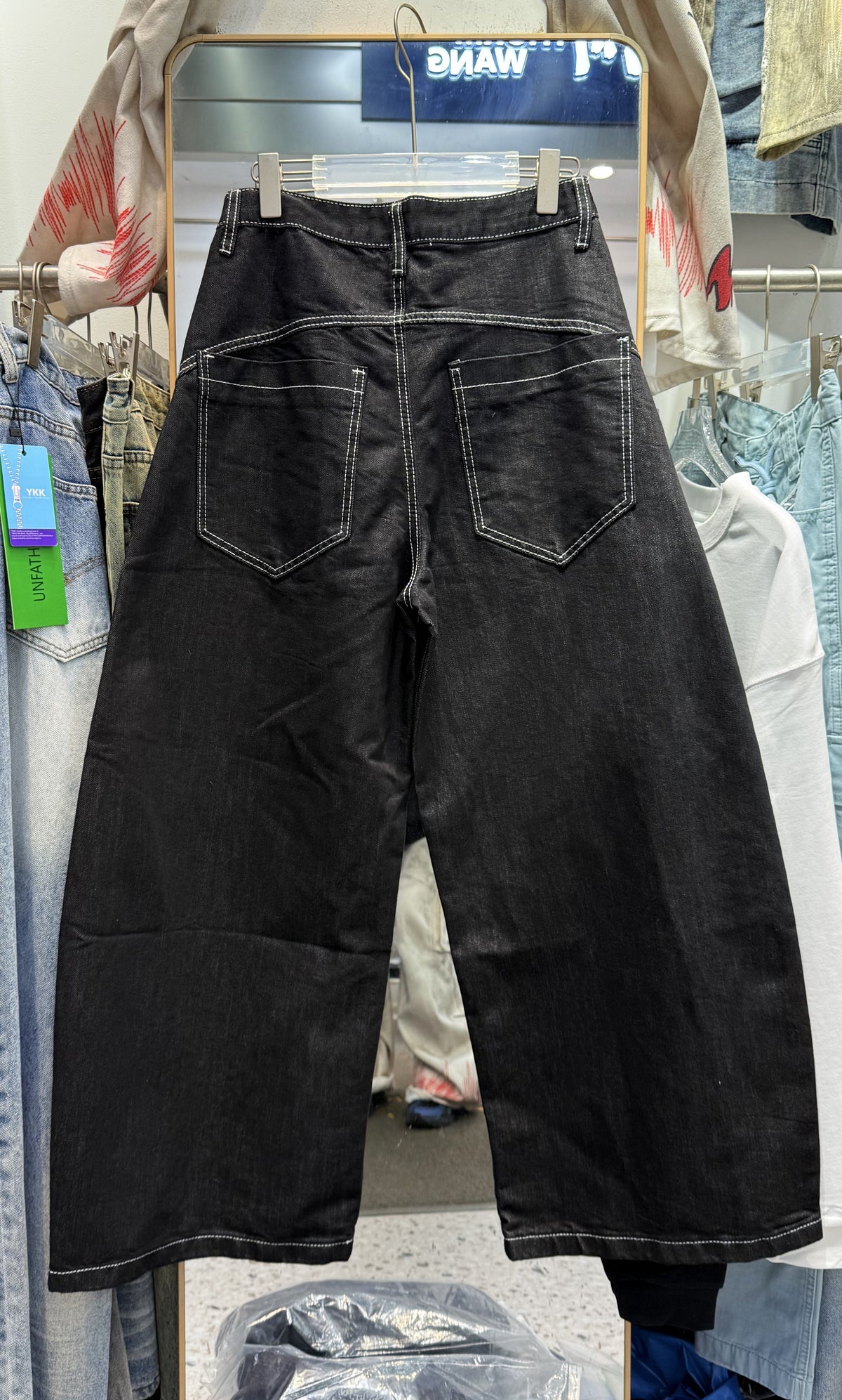 UNF BUTTON RAW BAGGY BARREL JEANS; Black; back view