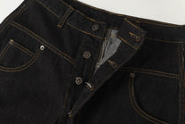 UNF ASYMMETRIC BUTTON PANEL JEANS; Black; garment construction detail