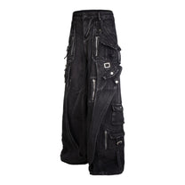 ZHANLAI LAYERED CARGO PANEL JEANS; Black; front view in a styled setting