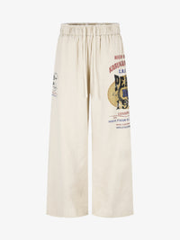 11KN | THIGH POSTER PRINT PANTS