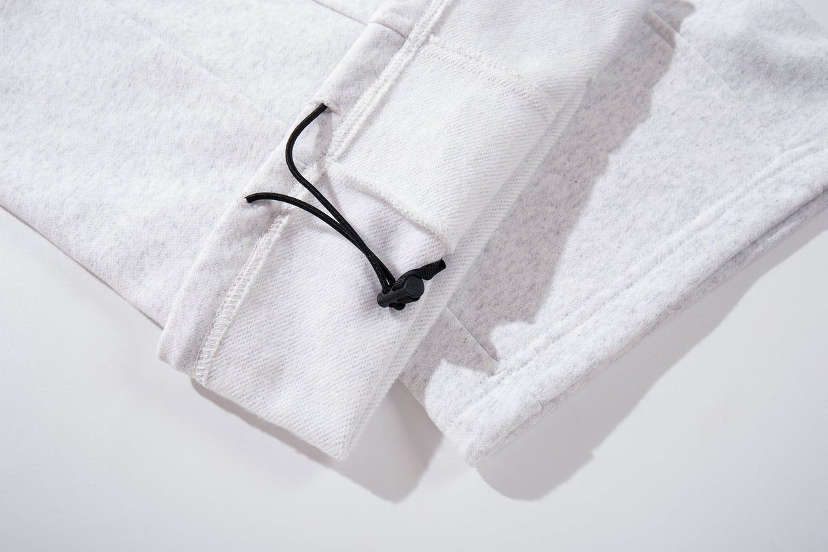 AW SPIKY HEAD FIREMAN CLASP BAGGY SWEATPANTS; Gray; garment construction detail