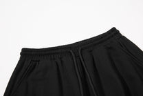 BF BORFEND RED PATCH WIDE LEG PANTS; Black; garment construction detail