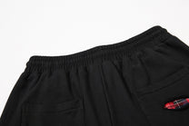 BF BORFEND RED PATCH WIDE LEG PANTS; Black; garment construction detail