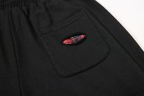 BF BORFEND RED PATCH WIDE LEG PANTS; Black; garment construction detail
