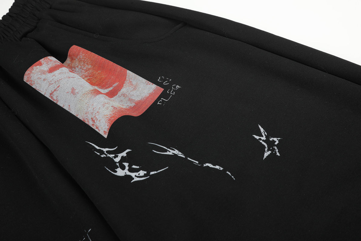 BLACK ENERGY STAR COLLAGE GRAPHIC SWEATPANTS; Black; design detail