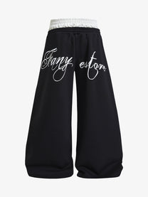 FANYE SCRIPT LETTER WIDE LEG PANTS; Black; back view