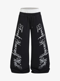 FANYE SCRIPT LETTER WIDE LEG PANTS; Black; front view