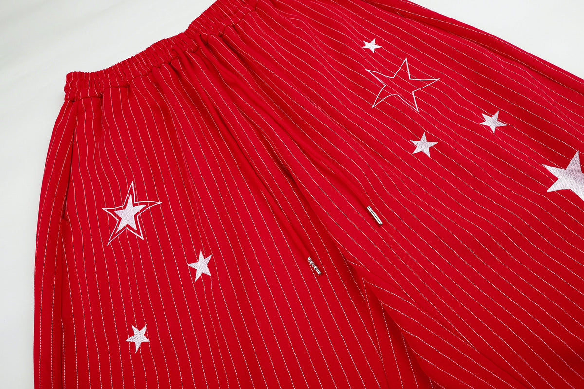 GEESAS STAR EMBROIDERY BAGGY BARREL SWEATPANTS; Red; design detail