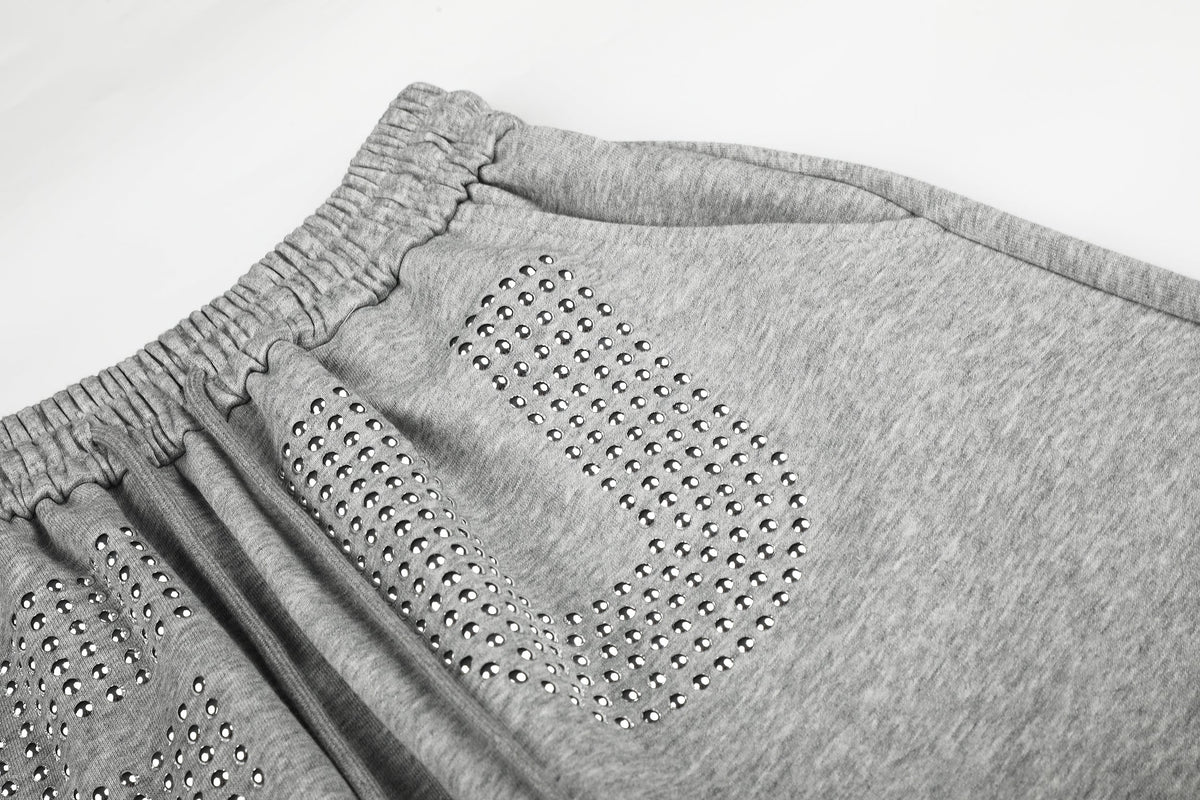 GEESAS STUDDED WASHED BAGGY BARREL SWEATPANTS; Gray; design detail
