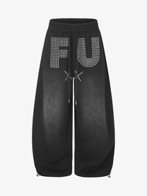 GEESAS STUDDED WASHED BAGGY BARREL SWEATPANTS; Black; front view