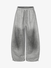 GEESAS STUDDED WASHED BAGGY BARREL SWEATPANTS; Gray; front view