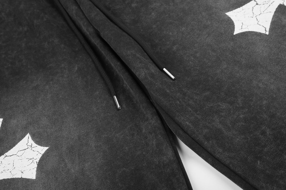 GEESAS WASHED CROSS WIDE LEG SWEATPANTS; Black; design detail