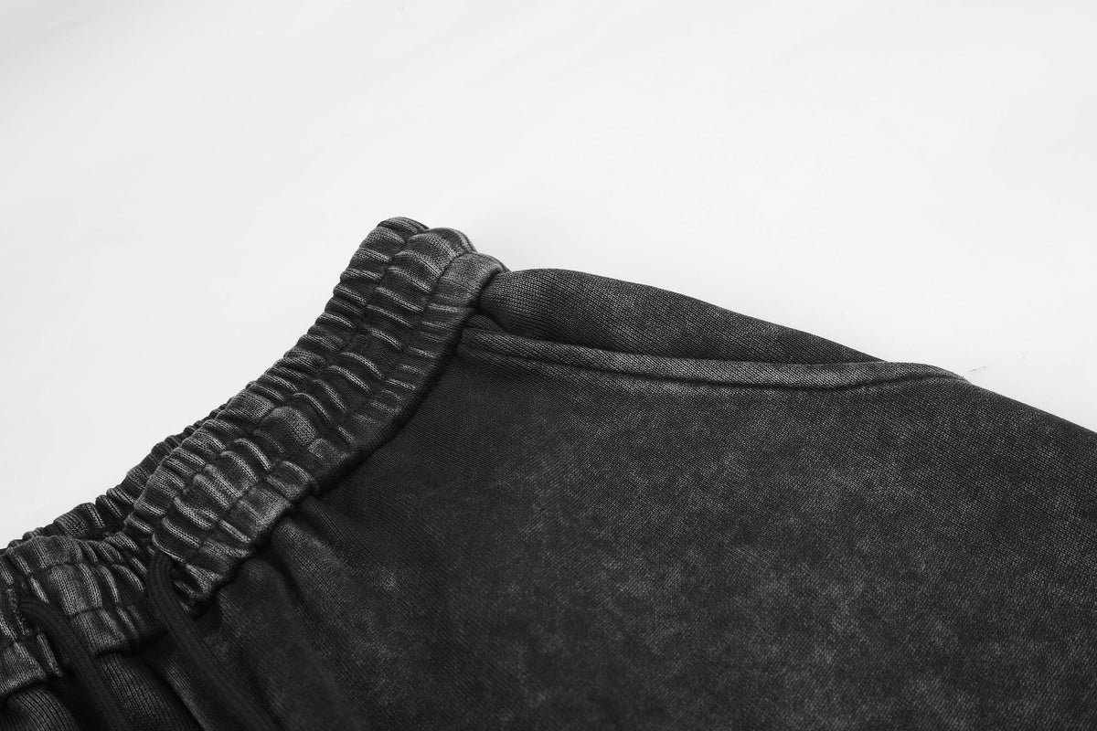 GEESAS WASHED CROSS WIDE LEG SWEATPANTS; Black; garment construction detail