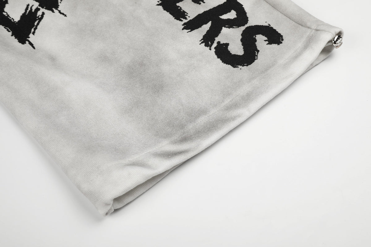 GEESAS DIAGONAL LETTER GRAPHIC SWEATPANTS; Gray; design detail