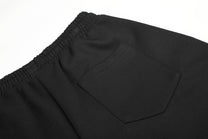 GEVANN SCRIPT EMBELLISHED WIDE SWEATPANTS; Black; garment construction detail