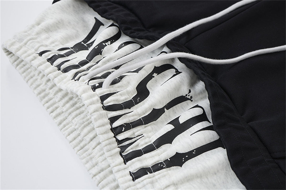 LETS ROCK NUMBER 28 STRIPE SWEATPANTS; Black; garment construction detail